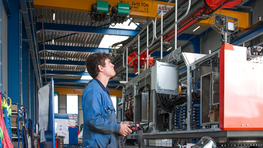 Mechanic inspects machine