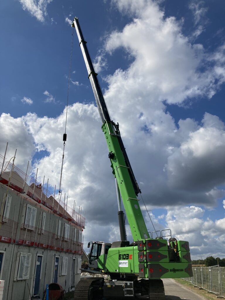Sennebogen 6103e aan het werk